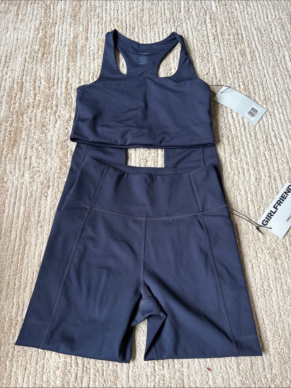 girlfriend collective navy racerback sports bra and high-waist leggings size  S